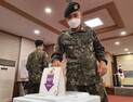 [포토]소중한 주권을 행사하는 군장병