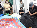 “고장난 우산에 새 생명을~”